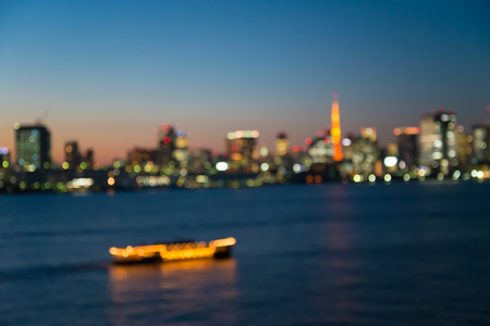 Defocused cityscape in twilight evening bokeh background, Tokyo Japanの写真素材