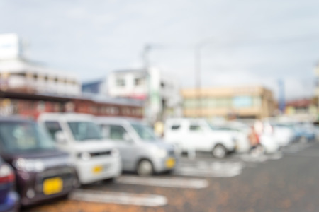 Abstract blur outdoor car parking lot in travel place bokeh backgroundの写真素材