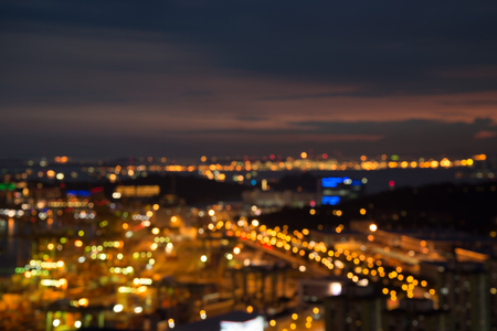 Abstract urban night light bokeh defocused backgroundの写真素材