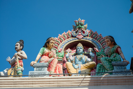 Detail of the Sri Mariamman Hindu Temple, little india, Chinatown in Singapore with blue skyの写真素材