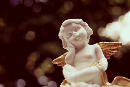 Angelic cupid statue - vintage retro effect style pictureの写真素材