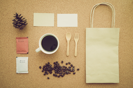 Above view of coffee identity set on cork table - Retro filter effectの写真素材