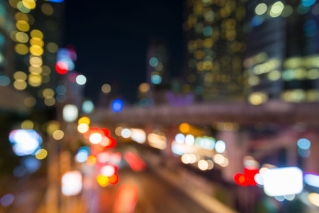 Blurred traffic night in city bokeh background, Bangkok cityscape