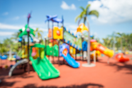 Abstract blur children playground in city park backgroundの写真素材
