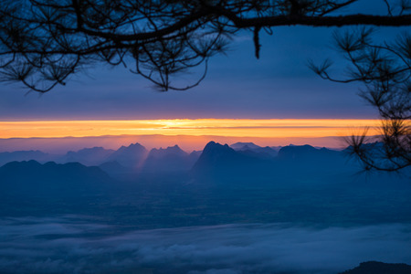 Dawn over the mountain and misty - Phukradung national park Thailandの写真素材