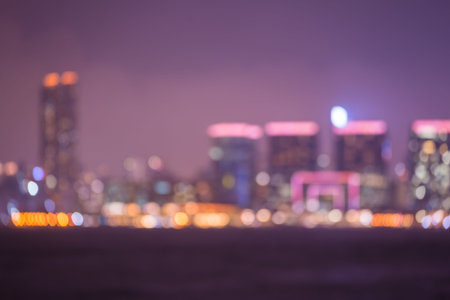 Abstract blur seaside night cityscape at night backgroundの写真素材