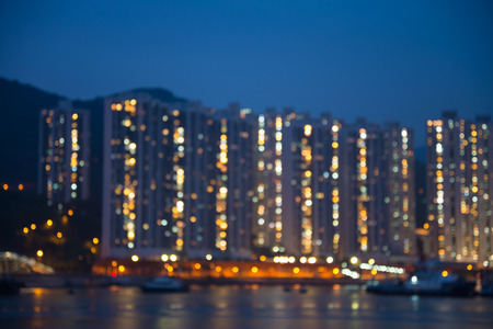 Abstract blur seaside cityscape in twilight evening with reflection backgroundの写真素材