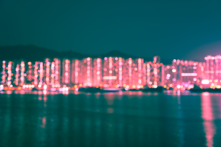 Abstract blur seaside cityscape in twilight evening with reflection background - Vintage toneの写真素材