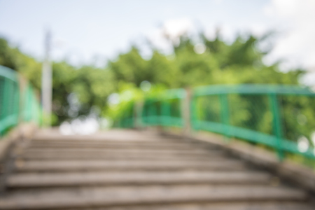 Abstract blur bridge in city park bokeh backgroundの写真素材