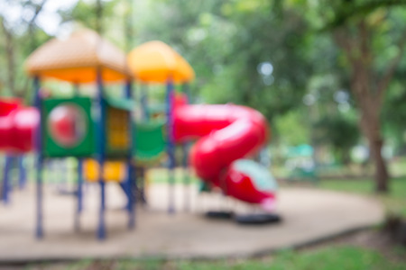 Abstract blur children playground in city park backgroundの写真素材