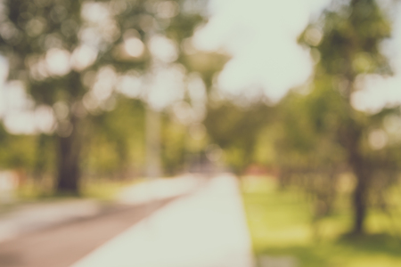 Abstract blur city park bokeh background - Vintage filter effectの写真素材