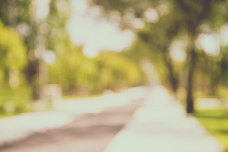 Abstract blur city park bokeh background - Vintage filter effectの写真素材