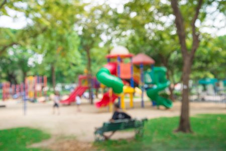 Abstract blur children playground in city park backgroundの写真素材