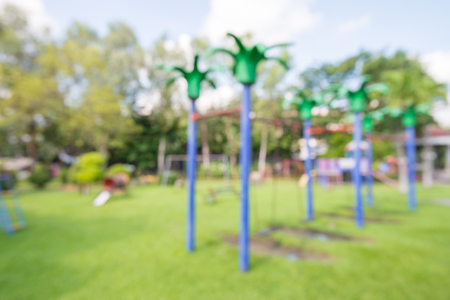 Abstract blur swing children playground in city park backgroundの写真素材