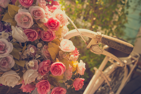 Vintage bicycle with flower - vintage effect filter styleの写真素材