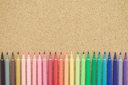 Color pen on cork wood backgroundの写真素材
