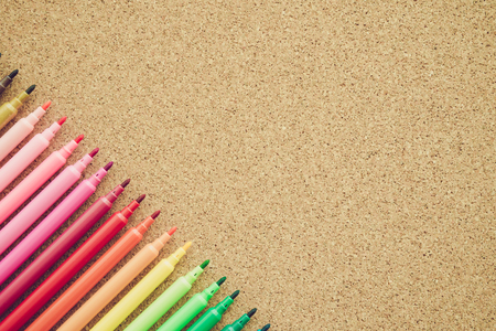 Color pen on cork wood backgroundの写真素材