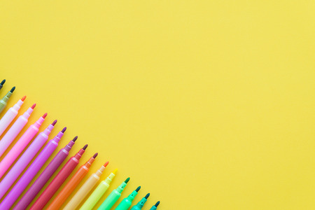 Color pen on yellow paper backgroundの写真素材