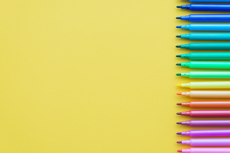 Color pen on yellow paper backgroundの写真素材