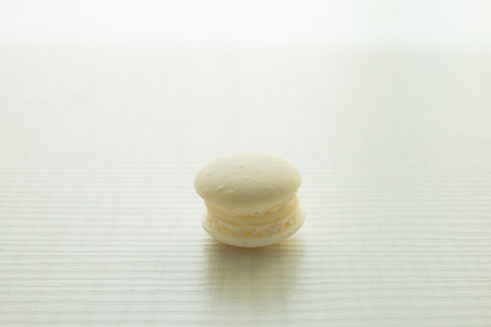 White france macarons on white wooden backgroundの写真素材