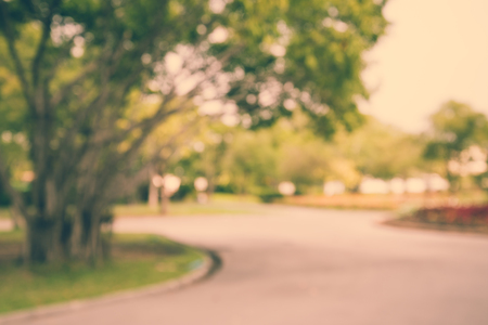 Abstract blur city park bokeh background - Vintage filter effectの写真素材