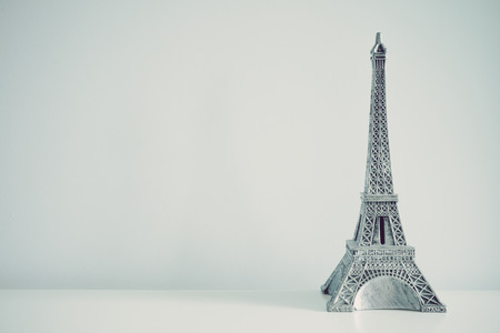 Eiffel tower model on white table background - Color tone effectの写真素材