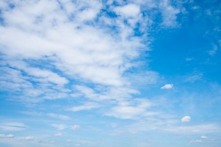 Bright blue sky with white cloudsの写真素材