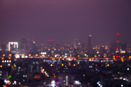 Abstract urban downtown night light bokeh , defocused backgroundの写真素材