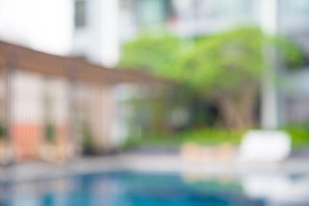 Abstract blur luxury swimming pool in hotel backgroundの写真素材