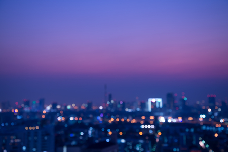 Abstract urban night light bokeh , defocused backgroundの写真素材