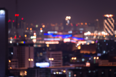 Abstract urban night light bokeh , defocused backgroundの写真素材