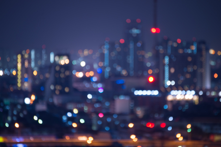 Abstract urban downtown night light bokeh , defocused backgroundの写真素材