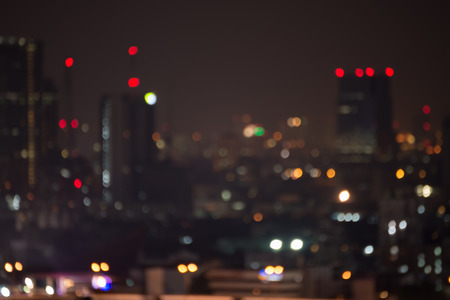 Abstract urban night light bokeh , defocused backgroundの写真素材