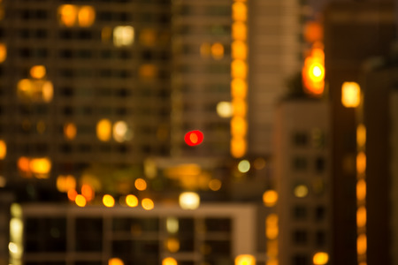Defocused cityscape at night light golden luxury backgroundの写真素材