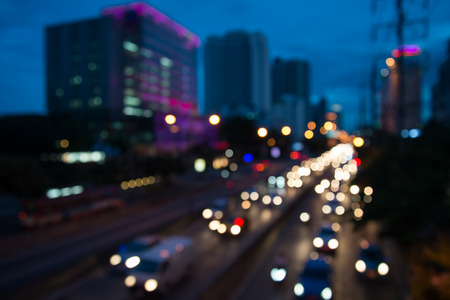 The evening twilight traffic in Bangkok city lights motion blurの写真素材