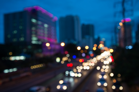 The evening twilight traffic in Bangkok city lights motion blurの写真素材