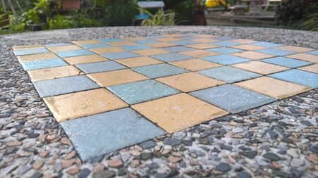 tile chessboard on stone tableの写真素材