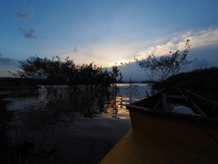 sunset in evening at damの写真素材