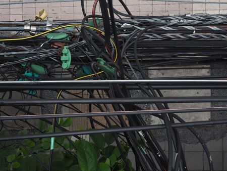 tangle wire on light poleの写真素材