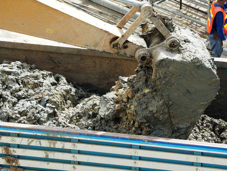 Digger machine is working in construction plantの写真素材