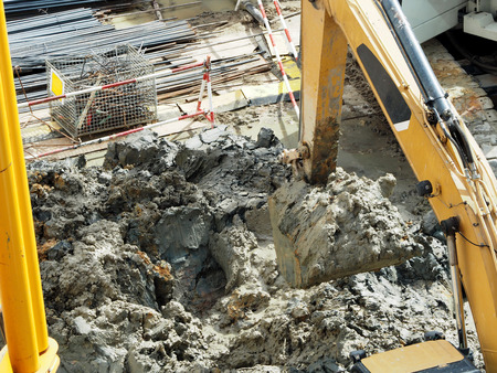 Digger machine is working in construction plantの写真素材