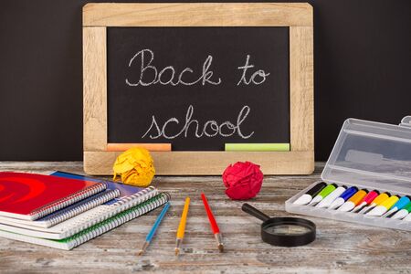 back to school, school supplies on wooden backgroundの写真素材