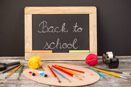 back to school, school supplies on wooden backgroundの写真素材