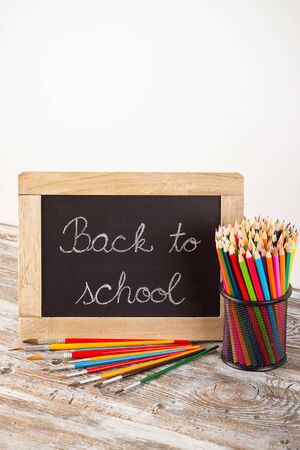 back to school, school supplies on wooden backgroundの写真素材