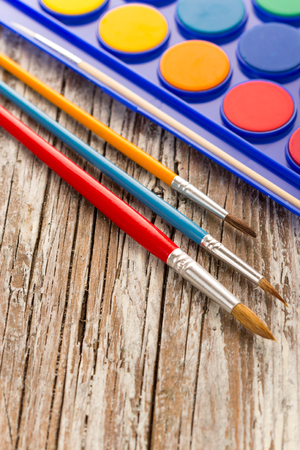 special painting tools on wooden background, education tools for schoolsの写真素材