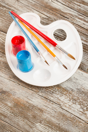 special painting tools on wooden background, education tools for schoolsの写真素材