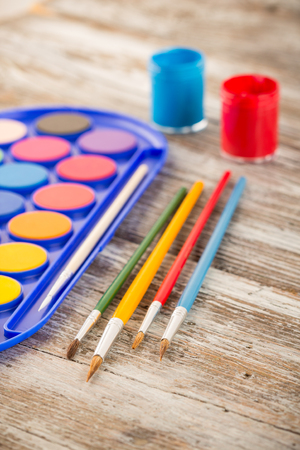 special painting tools on wooden background, education tools for schoolsの写真素材