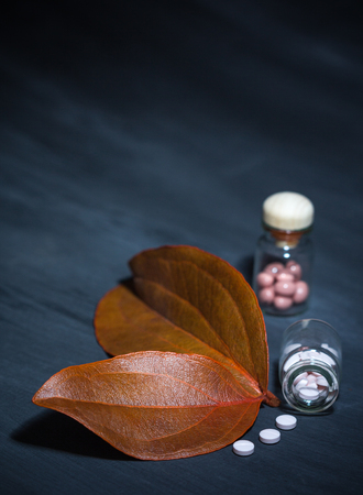 pharmaceutical dark concept with special pillsの写真素材