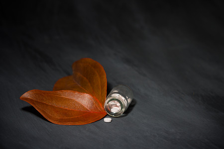 pharmaceutical dark concept with special pillsの写真素材