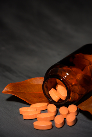 pharmaceutical dark concept with special pillsの写真素材